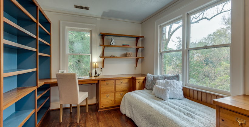 bedroom with wood-type flooring