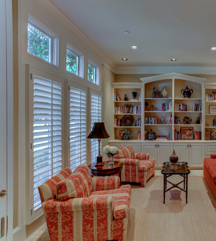 sitting room featuring carpet and natural light