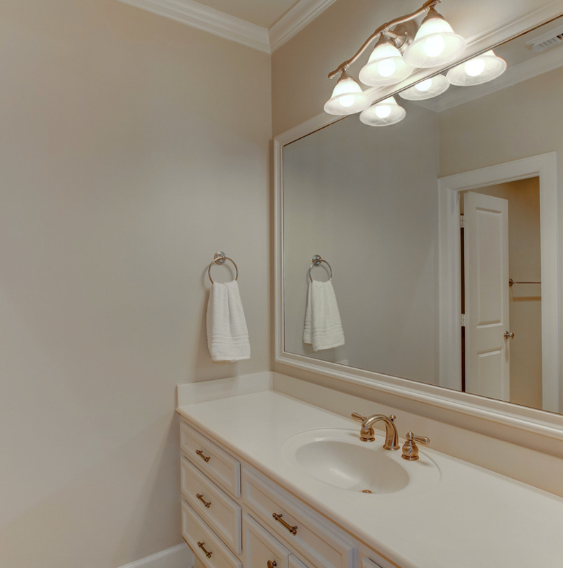 bathroom with vanity and mirror
