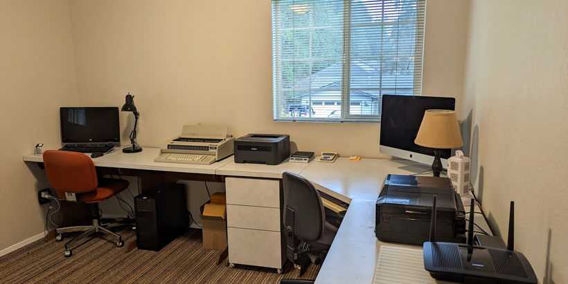 office area with natural light and TV